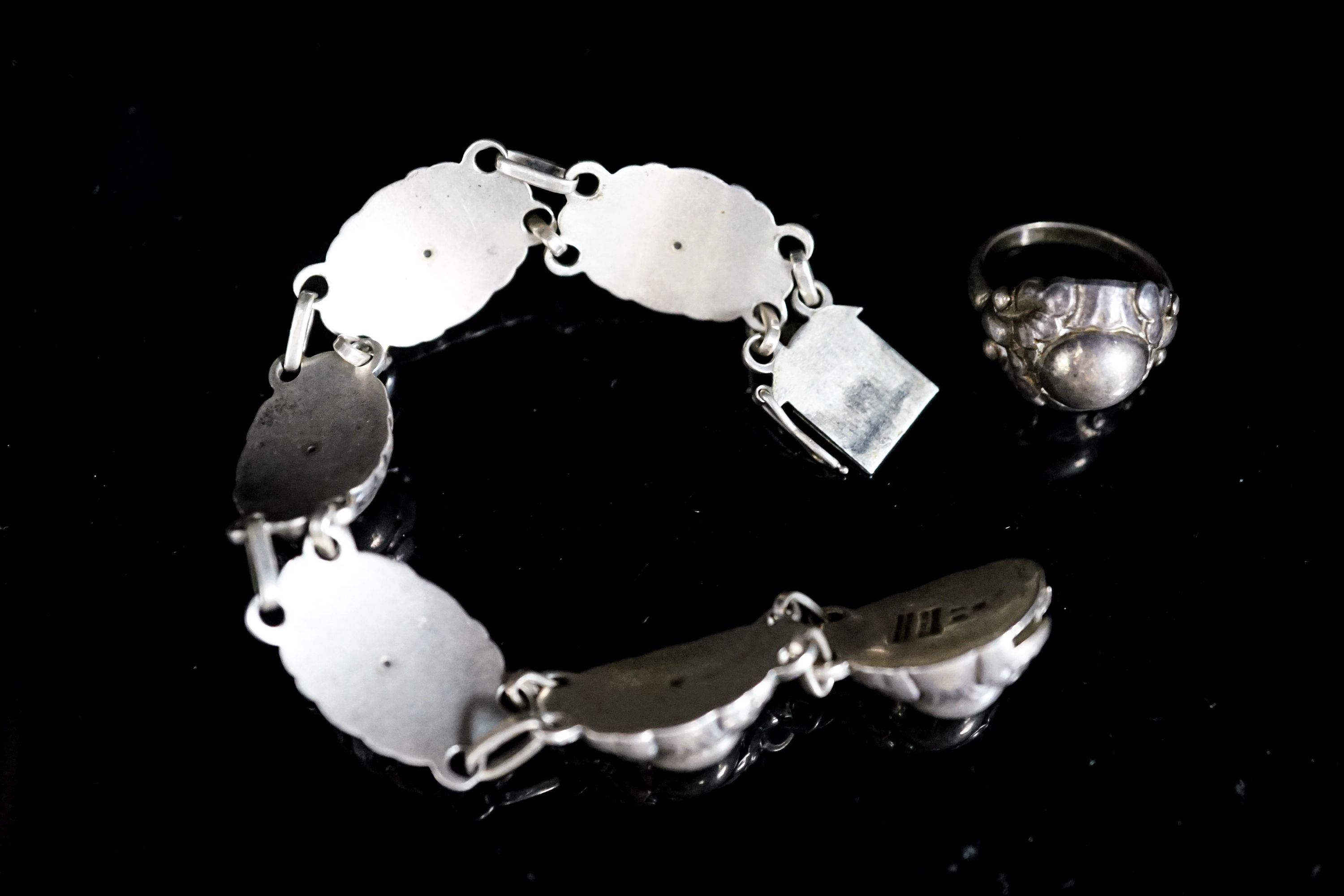 A Georg Jensen sterling bracelet, no. 57A, 18.5cm and a similar ring, no. 11A.